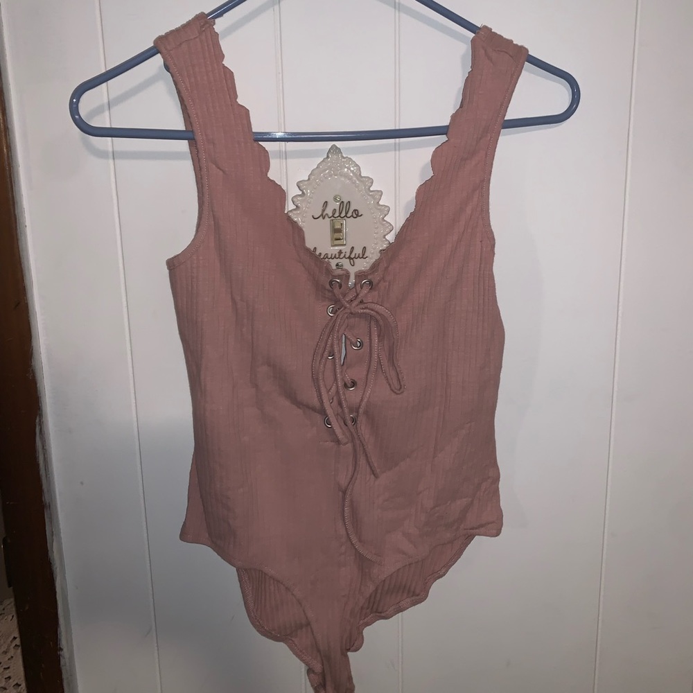light pink tie up front bodysuit